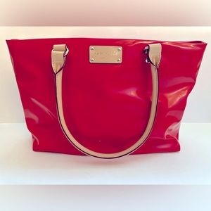 Kate Spade bag red patent leather newsprint lining